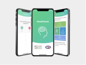 Three smartphones displaying the HeadCheck app interface